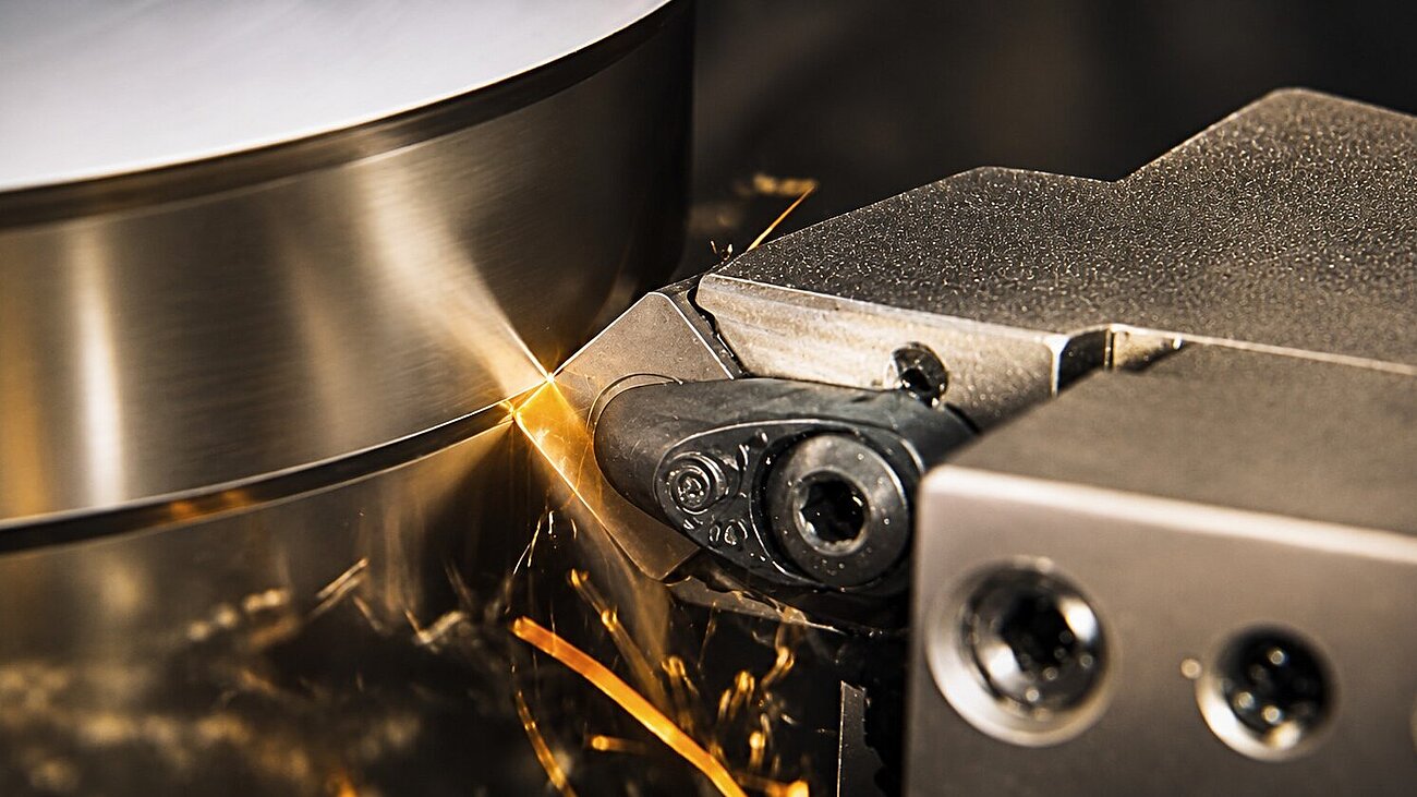 A ceramic cutting insert in use during turning