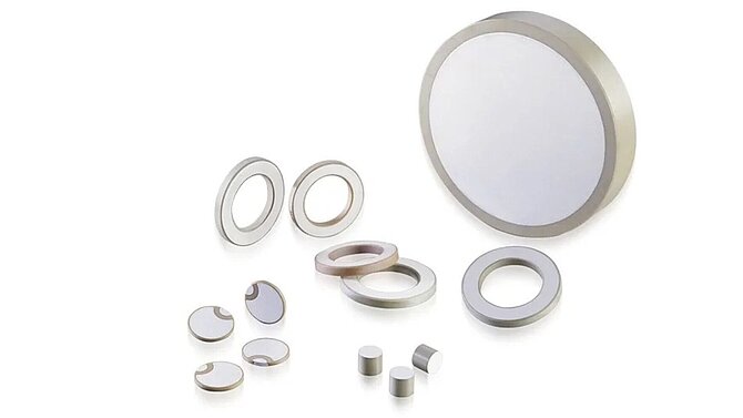 Piezoceramic rings and disks on a white background
