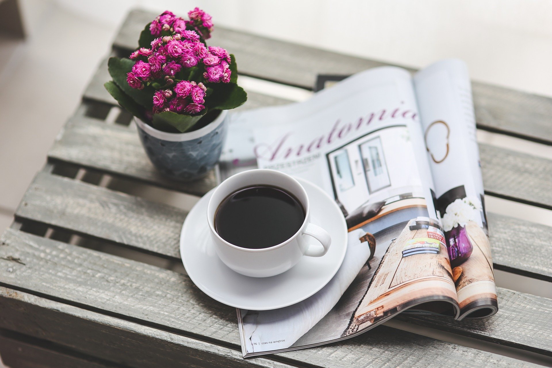 Press-Release A cup of coffee with a magazine